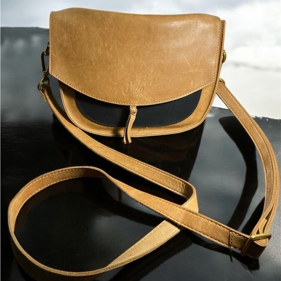 Sseko Tan and Black leather flap topCrossbody Bag